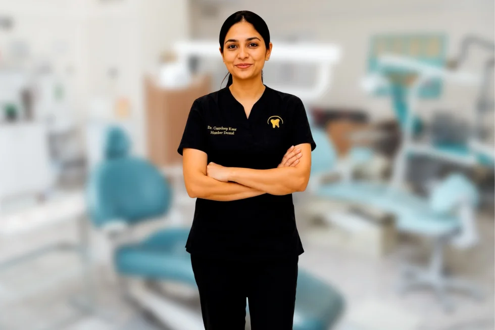 A Humber Dental clinician explaining treatment on a dental implant model